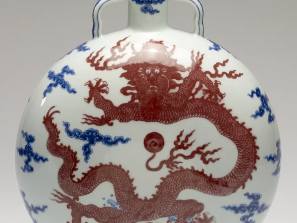 Chinese ceramic vessel decorated with a dragon moving through clouds Chinese ceramic vessel decorated with a dragon moving through clouds