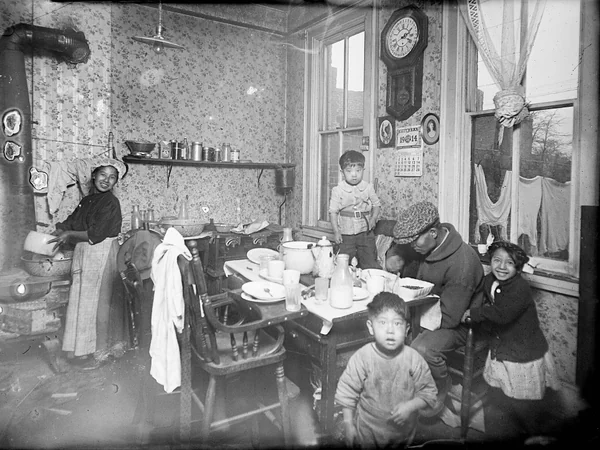 A Chinese American family sharing dinner at home in Denver