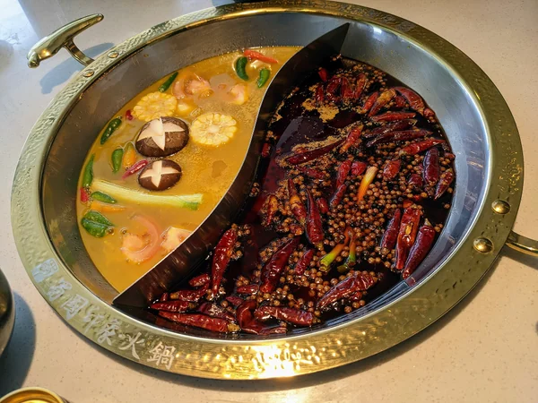 A two-section Sichuan hotpot served in Chengdu