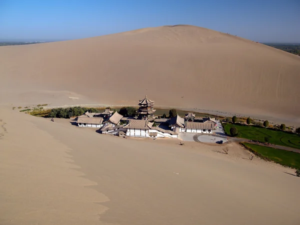 Crescent Spring oasis below the dunes of Mingsha Hill in Dunhuang