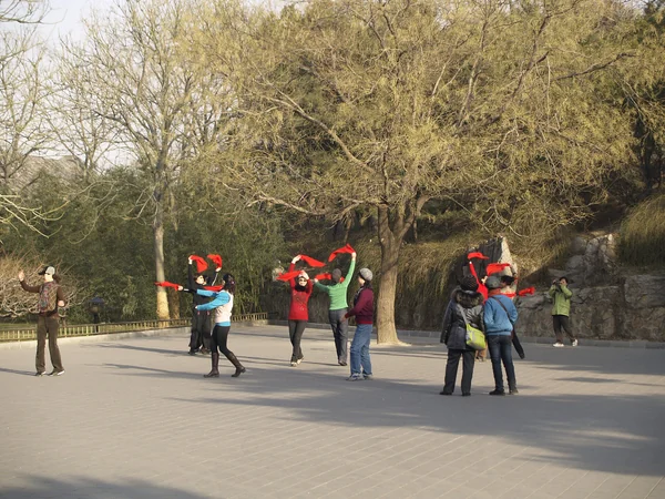 Residents taking part in group fitness dancing at Beijing’s Summer Palace Residents taking part in group fitness dancing at Beijing’s Summer Palace