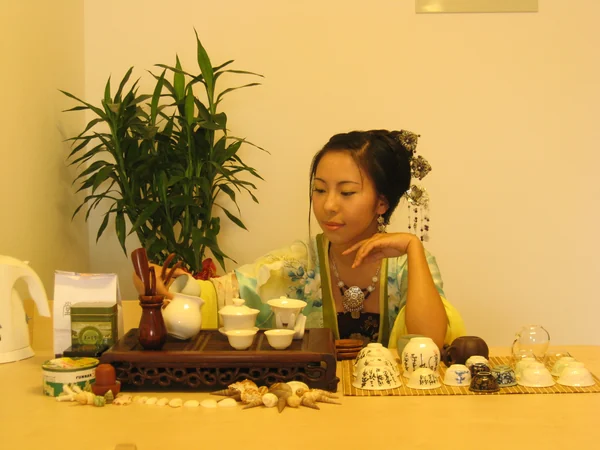 Utensils arranged in preparation for a Chinese tea ceremony Utensils arranged in preparation for a Chinese tea ceremony