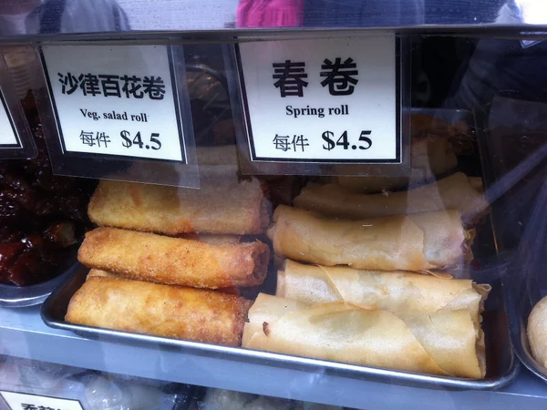 Crisp Chinese spring rolls cut open to show the filling Crisp Chinese spring rolls cut open to show the filling