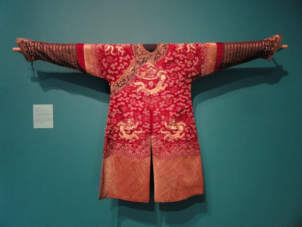 Qing court robe embroidered with dragons, clouds and waves Qing court robe embroidered with dragons, clouds and waves