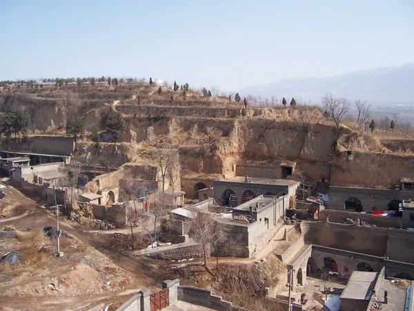 Arched entrances of yaodong cave dwellings on the Loess Plateau Arched entrances of yaodong cave dwellings on the Loess Plateau