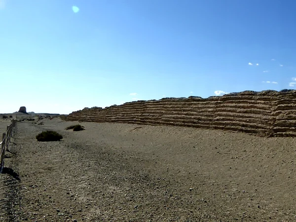 Ancient rammed-earth Great Wall remains in the dry landscape of Gansu Ancient rammed-earth Great Wall remains in the dry landscape of Gansu