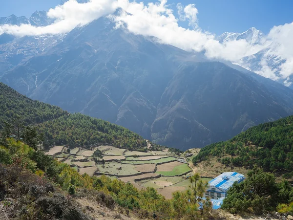 Trekkers on the trail near Everest View Hotel in the Nepal Himalaya Trekkers on the trail near Everest View Hotel in the Nepal Himalaya