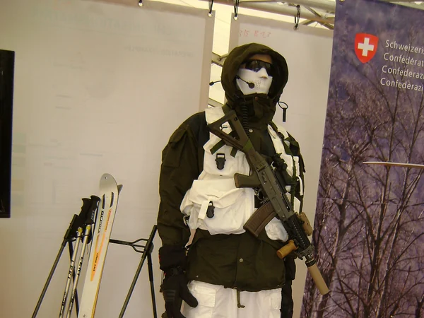 Cold-weather mountaineering clothing and equipment arranged for inspection