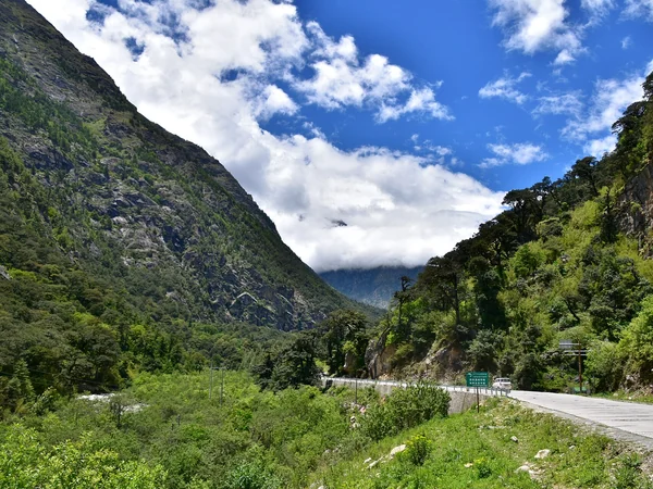 Road through a Himalayan valley on the overland route from the Everest region
