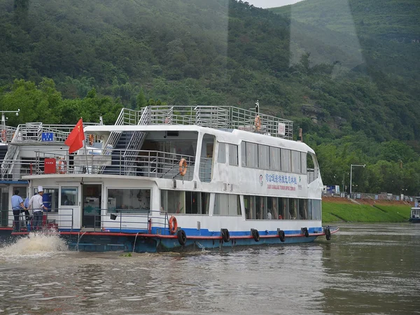 A boat journey through Guilin’s karst landscape, with duration and weather considered for children