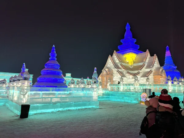Illuminated ice architecture in Harbin, a winter experience requiring serious cold-weather planning
