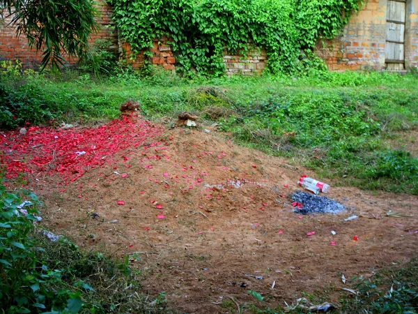 Red firecracker paper in Xian Tang Village during the Double Ninth Festival