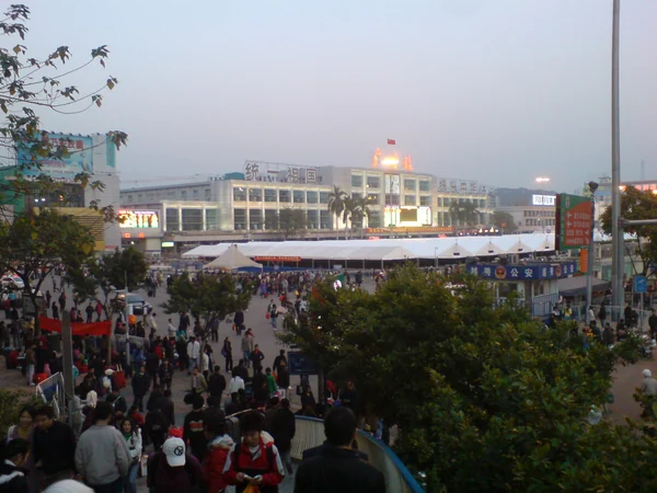Travelers at a railway station during a Chinese public holiday
