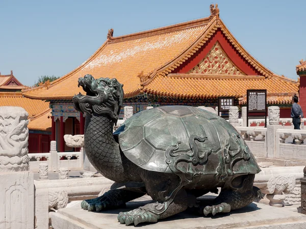 Bronze dragon-headed turtle sculpture in a Forbidden City courtyard