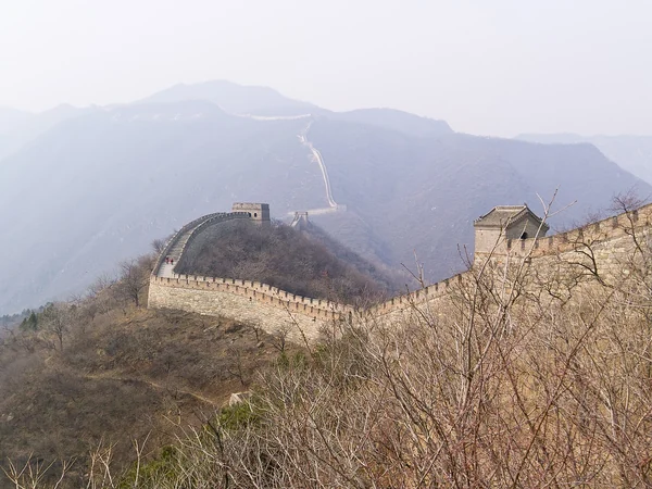 Visitors walking on a managed Great Wall section where heritage protection rules apply