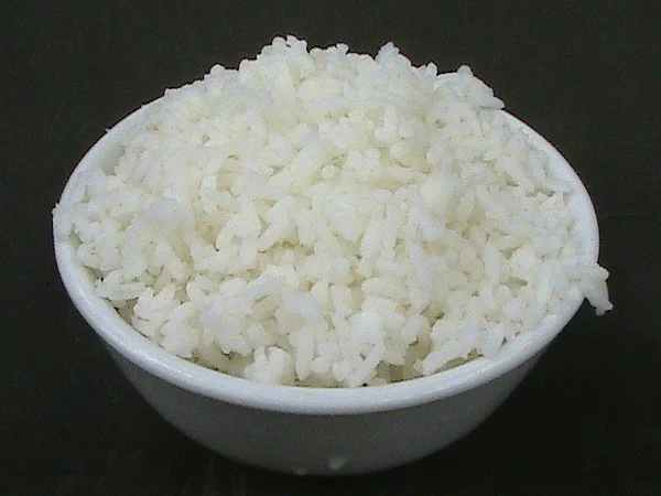 Steamed white rice served in a bowl at a restaurant in Haikou China Steamed white rice served in a bowl at a restaurant in Haikou China