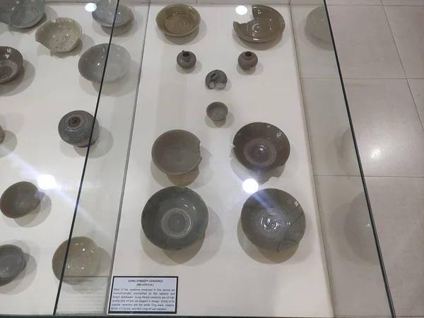 Chinese ceramic vessels displayed in a museum