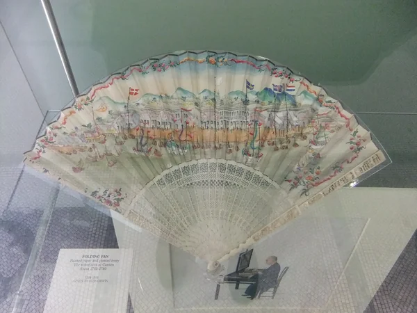 Traditional Chinese folding fan with painted decoration