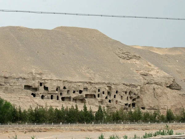 Cliff temples and facades at the Mogao Caves near Dunhuang