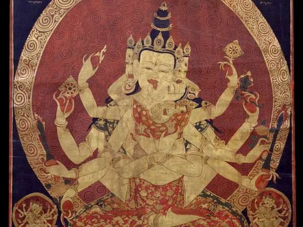 Historic Tibetan thangka painting in a museum collection Historic Tibetan thangka painting in a museum collection