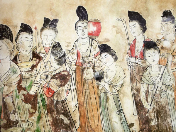 Tang-period figures shown in a preserved social scene Tang-period figures shown in a preserved social scene