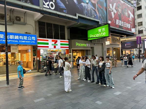 Real street shopping scene with pedestrians in Causeway Bay, Hong Kong