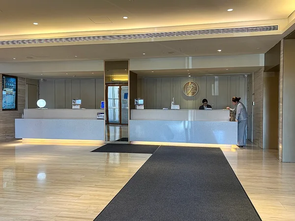 Beijing hotel check-in lobby illustrating passport and registration procedures Beijing hotel check-in lobby illustrating passport and registration procedures