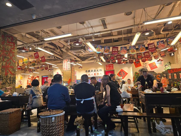 Diners inside a Chengdu hot pot restaurant