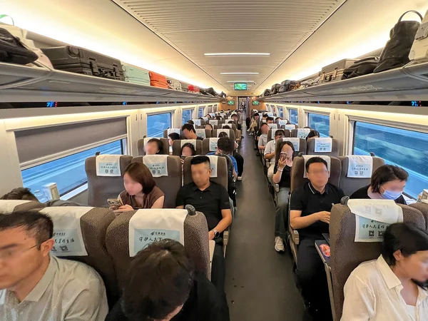 First-class seats arranged inside a Chinese high-speed train First-class seats arranged inside a Chinese high-speed train