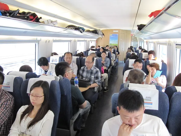 Luggage stored in a rack inside a Chinese high-speed train Luggage stored in a rack inside a Chinese high-speed train