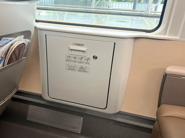 Premium first-class table seating beside a window on a Chinese high-speed train Premium first-class table seating beside a window on a Chinese high-speed train
