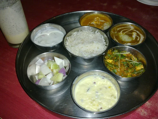 Indian thali meal representing dining choices for Indian travelers in Beijing