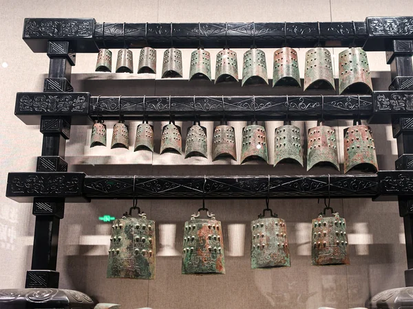 Ancient Chinese bianzhong bronze bells in a museum