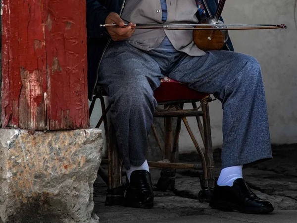 Musician playing the two-stringed erhu
