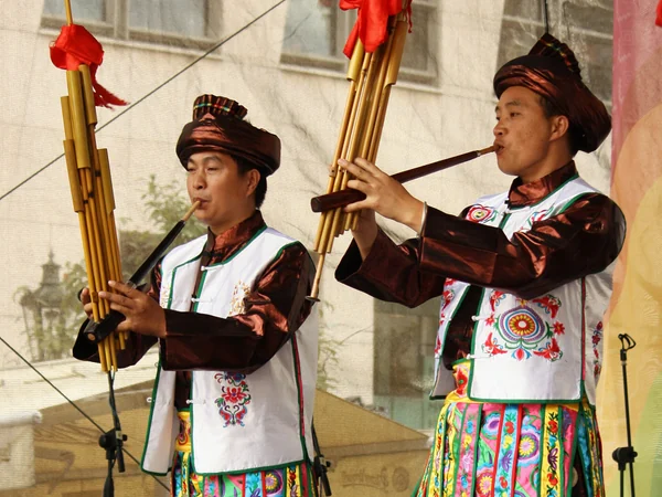 Lusheng pipe instruments played at a Guizhou festival