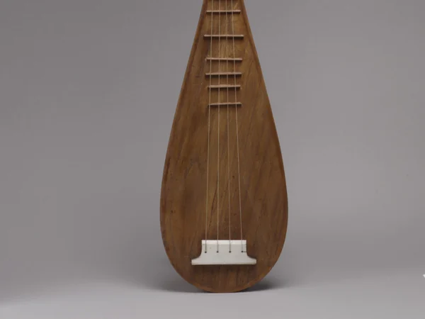 A pear-shaped pipa lute displayed in a museum collection