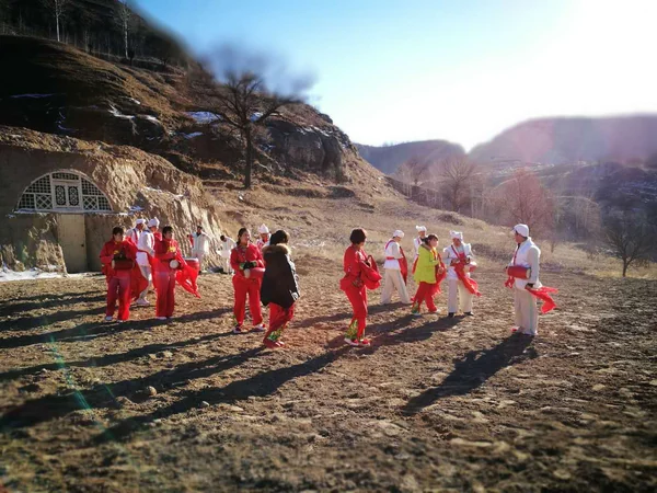 Performers playing waist drums in northern China