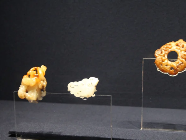 Chinese jade jewellery in a museum collection Chinese jade jewellery in a museum collection