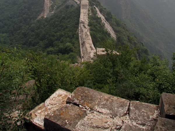 Unrestored Jiankou Great Wall following a steep mountain ridge Unrestored Jiankou Great Wall following a steep mountain ridge