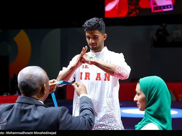 Wushu athlete preparing for an international tournament