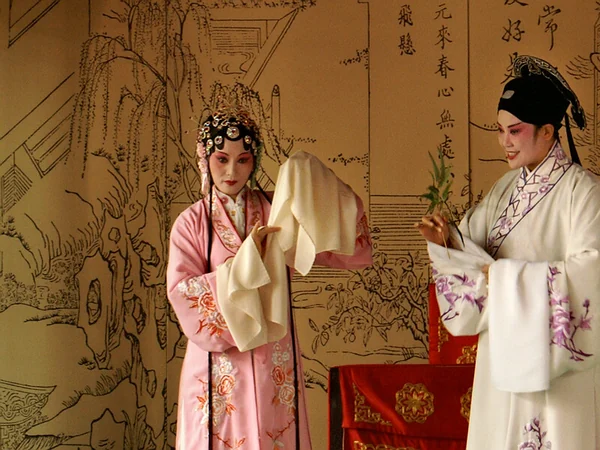 Kunqu opera performers coordinating song, gesture and movement