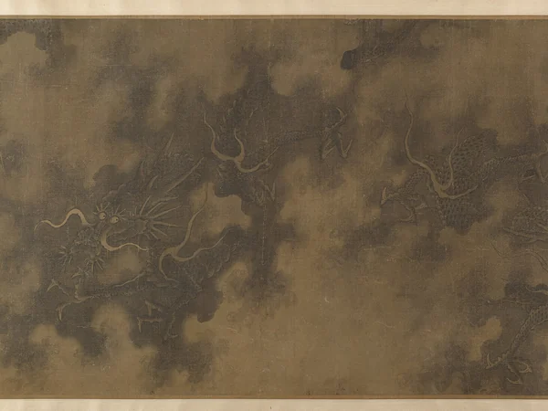 Detail from a historic Chinese handscroll depicting dragons among clouds Detail from a historic Chinese handscroll depicting dragons among clouds