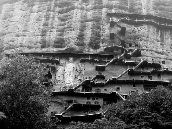 Historic cliff façade and walkways at the Maijishan Grottoes
