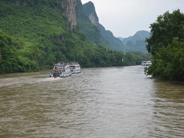Visitors viewing the Li River landscape in Guilin