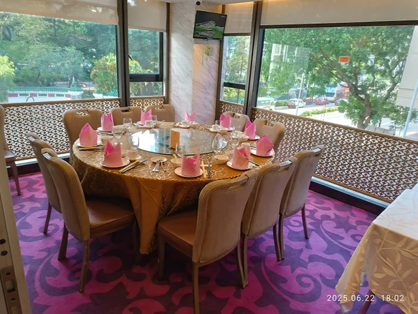 Formal round banquet table prepared for guests in a Chinese restaurant Formal round banquet table prepared for guests in a Chinese restaurant