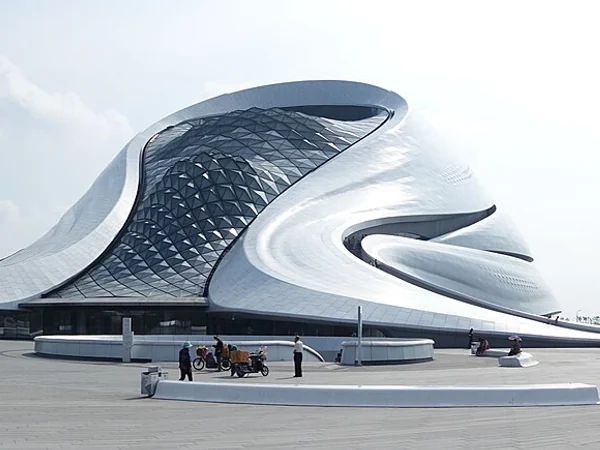 Curving white exterior of Harbin Opera House