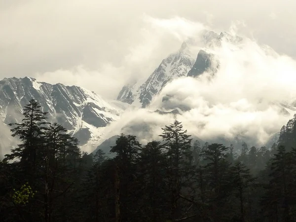 Mount Gongga rising above the mountains of western Sichuan