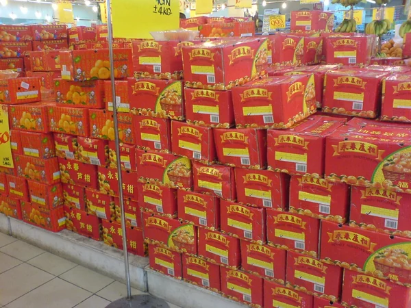 Gift boxes of seasonal fruit displayed for Chinese New Year