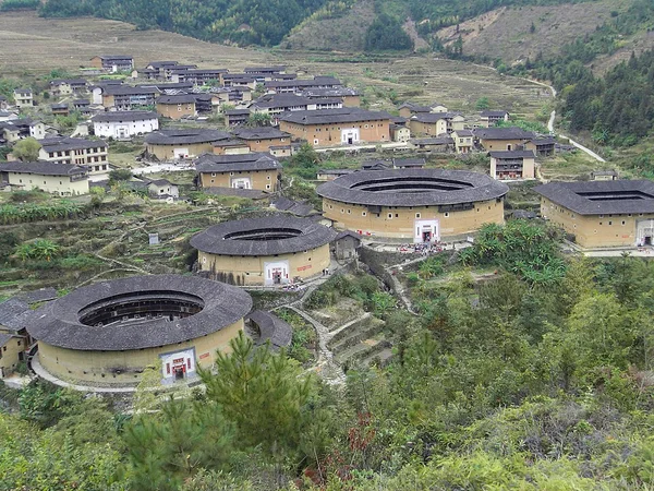 Chuxi Tulou cluster among cultivated hills in Fujian province Chuxi Tulou cluster among cultivated hills in Fujian province