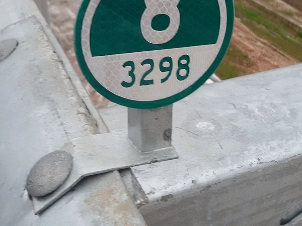 Highway marker in China displaying the number 3298.8 Highway marker in China displaying the number 3298.8